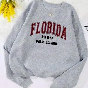 Medium grey florida crewneck. Very cozy and cute!